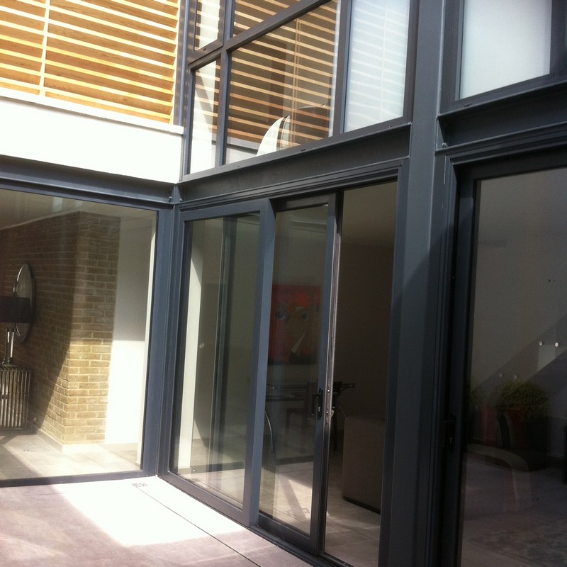 Anthracite aluminium sliding patio doors fitted in Banstead